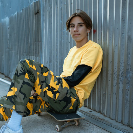 A teenager sits on a skateboard outside the Matthews House shelter